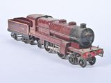 a toy train that is sitting on a white surface
