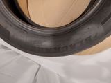 an image of a close up of a tire on a cardboard box