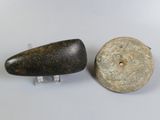 pair of rocks on acrylic stand on white surface