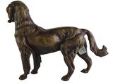 bronze statue of a dog with a tag on it ' s collar