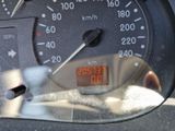 a close up of a speedometer on a car ' s dashboard
