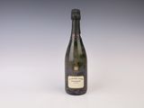 an image of a bottle of champagne on a white surface