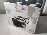 packaging of a black and white box containing a pair of shoes