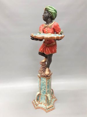 Porte-torchère en bois polychrome à décor d'un nubien.