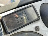 a close up of a gauge on the dashboard of a motorcycle