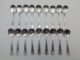 a lot of spoons that are sitting on a table