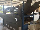 a large machine that is sitting inside of a building