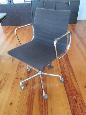 a chair that is sitting on a hard wood floor