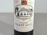 a bottle of wine that is sitting on a table