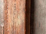 a close up of a piece of wood on a wall