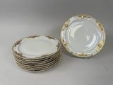 several plates are stacked on top of each other on a table