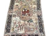 an oriental rug with a horse and rider on it