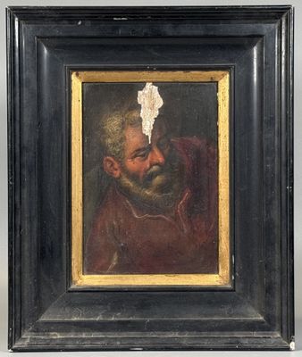 un vieux tableau représentant un homme barbu avec un bout de papier déchiré sur le front