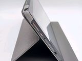 a close up view of a tablet computer on a stand