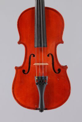 an old violin with a bow on a white background