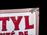 a red and white sign that says tyl nite be