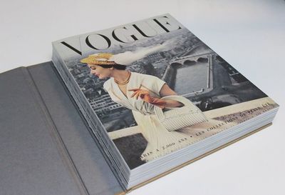 a book with a picture of a woman sitting on a bench