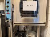 an image of a commercial oven with a sign on it
