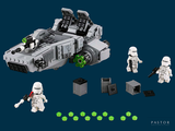 a lego star wars vehicle with a lego figure next to it