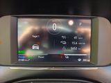 the dashboard of a car with a digital display on it
