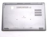 a close up of a silver laptop with a white background