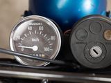 a close up of a gauge and a blue ball