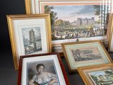 several framed and unframed prints of a woman in a blue dress