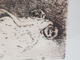 a black and white drawing of a man laying on the ground