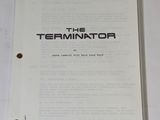 un papier blanc sur lequel est inscrit « Terminator »