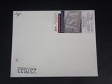 an envelope with a picture of a man on it sitting on a table