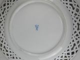 a white plate with a blue cross on it