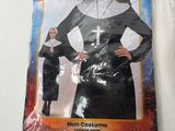 a picture of a nun costume on display on a refrigerator