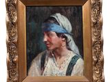tableau représentant une femme portant un foulard bleu, dans un cadre doré
