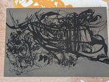 a picture of a black and white drawing on a piece of paper