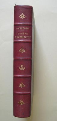 a red book that is sitting on a table