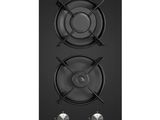 une plaque de cuisson noire à deux feux et deux boutons