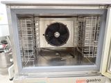 an image of a stainless steel oven with a fan inside of it