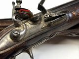 an old gun that has been used as a weapon for a war
