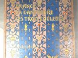 un livre bleu et rose orné d'un motif doré
