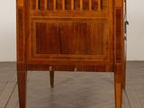 an image of a small wooden table with drawers on it