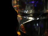 a close up of a bottle of water on a table