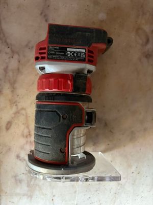 a picture of a corded sander on a table