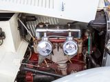 a close up of a car ' s engine with the hood open