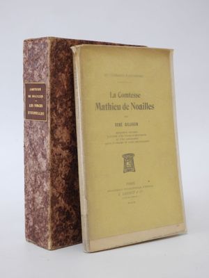 a book that is sitting on a table next to a book