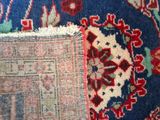 a close up of a rug with a picture on it
