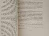 an open book with a picture of a cat on it