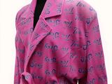 pink robe with blue numbers on it on a mannequin mannequin mannequin mannequin mannequin mannequin mannequin manne