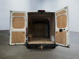 an image of a white van with its doors open