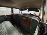 an old car that is sitting in the back of the car