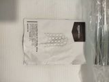 a package of toilet paper sitting on a white surface